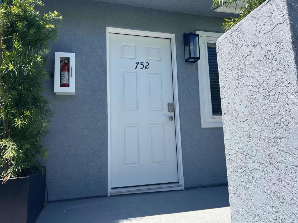 Located in a private, quiet alley behind a main house, this updated apartment is one of four units in the complex. The layout offers the convenience of an in-unit laundry closet, wall AC unit, detached 1 car garage. Tenant pays for all utilities, and one pet may be considered upon approval.