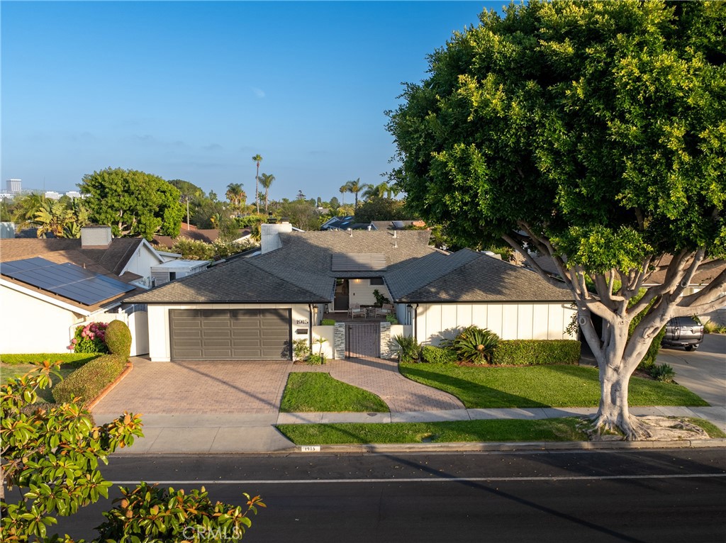 Single-level coastal living in the heart of Newport Beach. This 4-bedroom, 2-bath home spans over 2,400 sq. ft. with an open layout that blends style and comfort. The kitchen shines with broad quartz counters, custom cabinetry, and a 6-burner Thermador range, opening to living and dining areas with a custom bar and wine fridge, perfect for entertaining. Natural light fills the home, highlighting upgrades like porcelain wood-look tile, built-in closet systems, and a spa-inspired primary suite. Modern conveniences include fully owned solar, new HVAC, EV charging, and an epoxy-coated garage. A private backyard offers a quiet retreat. An exceptional turn-key value in the coveted Mariners/Dover Shores community. 1915 Mariners Dr. offers turnkey comfort today with room to grow tomorrow, while expansion plans in hand allow for growth up to 3,000 sq. ft., in one of Newport’s most desirable neighborhoods. An ideal walkable location near the Back Bay, top schools, popular parks, Newport Beach Library, and the Westcliff's dining & shopping.