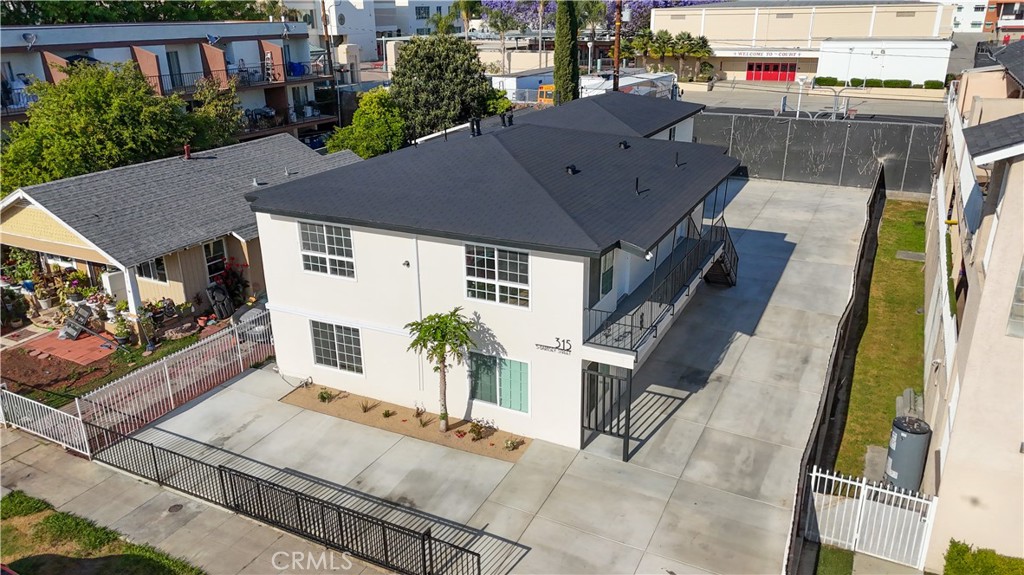 Discover the opportunity to step into a fully renovated, turnkey 5-unit apartment building designed for passive income. Each spacious 1-bedroom, 1-bath unit offers 633 sq ft of comfortable living space, outfitted with brand-new ranges, refrigerators, washer/dryers, blinds, and mini-splits for optimal comfort. The property features a modern concrete parking area with three single-car garages and six additional parking spaces. Plus, inquire about assuming the seller’s attractive 5.75% loan. This is a rare chance to acquire a well-maintained, income-generating asset ready for immediate rent collection. Don’t miss out on this prime investment opportunity.