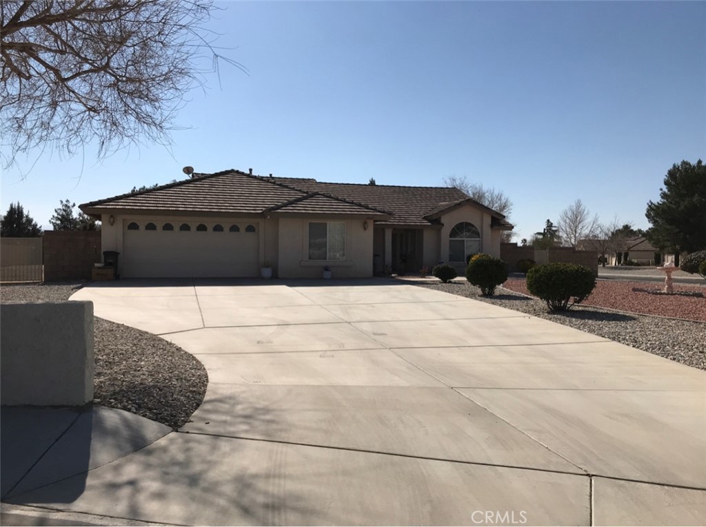 Single story home in desirable West River Bend Community! Enjoy spacious living with both a formal living room and a family room featuring a fireplace, perfect for relaxing or entertaining. The kitchen comes complete with a stove, dishwasher, and built-in microwave. Step outside to landscaped front and backyard areas, with a covered patio ideal for outdoor dining and entertaining. A generous side yard provides extra space for storage, gardening, or play. Additional features include HVAC and an attached 2-car garage with a built-in bonus room. Renters' insurance required. 19187 Cochise WAY.