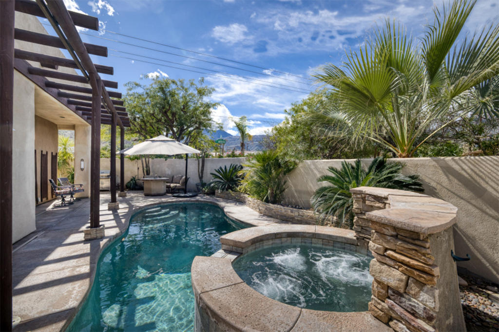 Discover the vibrant spirit of La Quinta Cove with your own slice of paradise! This charming retreat offers a serene oasis, promising tranquility amidst the desert landscape. Natural light floods the living spaces, highlighting the seamless connection to the outdoor oasis. The guest bathroom boasts a spacious walk-in shower, while the primary bathroom features a glass-encased shower with pool views and ample storage. Step outside to enjoy a wraparound patio overlooking a generously sized pool and spa, perfect for taking in the breathtaking west-facing views. Inside, the Santa Fe-inspired architecture showcases high ceilings, clearstory windows, and bright interiors, creating a harmonious blend of indoor and outdoor living. Situated on a prime corner lot, this home features a rare layout of 3 bedrooms and 3 bathrooms, including two en-suites with walk-in closets. The primary suite offers easy access to the private pool area, ensuring relaxation at your fingertips. With its ideal combination of privacy and convenience, this corner-lot gem embodies the essence of Cove living at its finest.Pool cleaning service and gardening included.