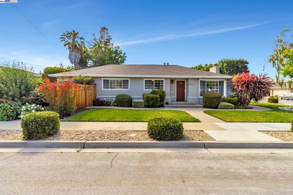 Welcome to 4977 Evans Avenue, located in one of the most desirable neighborhoods in Fremont! This sizable lot features a rare and highly functional layout with two master en suites, along with a formal family, dining, and living room. The interior boasts an updated kitchen with custom cabinetry, sleek countertops, stainless steel appliances, and fresh interior paint, making it truly move-in ready. The spacious backyard provides ample room for entertaining, gardening, or simply enjoying California sunshine in peace. Located in "Upper" Glenmoor, residents can enjoy easy access to highly rated schools including a quick walk to the elementary school, as well as community parks, and local eateries. Fremont was recently ranked the "Happiest City to Live in the U.S.," and this home embodies that lifestyle with it's ideal blend of comfort and community charm. Conveniently located near highway 880, Tesla, and Silicon Valley!