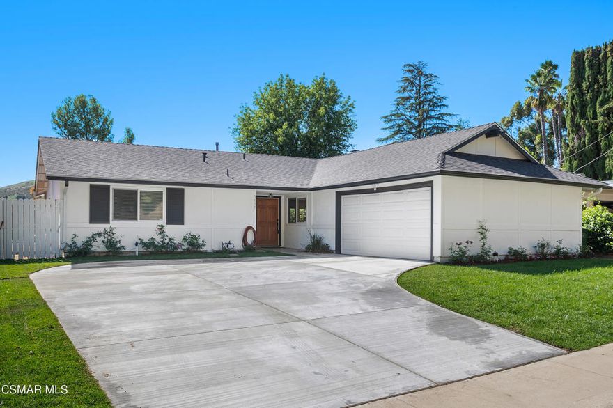 Nestled within the picturesque community of Calabasas, this stunning 4 bedroom, 3 bath, single-story home has been meticulously remodeled to combine modern elegance with the charm of California living. This spacious residence offers a comfortable and luxurious lifestyle and the exterior exudes a contemporary yet timeless aesthetic, with a neutral color palette and clean lines.Upon entering, you're welcomed into an open-concept living space where the main living room with French doors seamlessly transitions into the dining area and kitchen. Natural light floods the interior through large windows, highlighting the rich new French oak-like wide plank luxurious vinyl flooring that flows throughout the home. Recessed lighting and sleek fixtures add a touch of sophistication.The kitchen is a culinary enthusiast's dream, featuring high-end stainless steel appliances, including a professional grade range with six gas burners, dishwasher, microwave and refrigerator. A spacious counter offers a breakfast bar as a gathering place for family and friends. The primary bedroom at the rear of the house is a serene retreat, boasting ample space, with views to the rear yard and sliding door. The brand new en-suite primary bathroom is a spa-like oasis, with  a glass-enclosed shower, contemporary fixtures, elegant tiling and a new vanity with make-up mirror with touch screen that adjusts the lighting. There is a second ensuite bedroom plus two additional bedrooms which provide comfort and versatility, ideal for guests, children, or a home office. The backyard is an entertainer's paradise, featuring a spacious covered patio area for al fresco dining.   Fantastic views of the mountains offer a private haven for relaxation and recreation. The yard also provides ample space for gardening, outdoor activities, and enjoying the Southern California sunshine.Located in the prestigious city of Calabasas, residents benefit from a peaceful suburban setting while still being within close proximity to shopping, dining, and entertainment options. With its modern upgrades, thoughtful design, and prime location, this remodeled single-story home is a true gem that encapsulates the essence of comfortable and luxurious living in the heart of Calabasas.