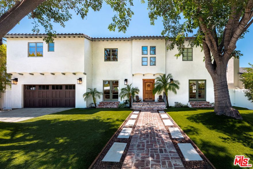 Presenting the timeless design of the famed Montecito Spanish Revival in Studio City's acclaimed Colfax Meadows; what Los Angeles Magazine named, 'One of the Ten Best Neighborhoods in L.A.' A celebration of an extraordinary tradition of historic architectural distinction with sophisticated, modernized features compatible with today's contemporary California lifestyle. Crowning a magnificent, near 1/4 acre lot, the property resides in divine harmony with its organic setting of towering trees and verdant greenery. Fully gated for privacy and security, the exterior presentation is stunning simplicity. Inside, the warmth, character and fine craftsmanship is articulated thru design elements appropriate to the Spanish motif. Splendid, spacious rooms proportionately complement each other. Combinations of Carrera marble generously embellish all baths. The kitchen is presented as an exceptionally designed culinary center designed for the cuisine artist with a full complement of state of the art Thermador professional appliances. Abundant French pane doors and windows embrace the home in light, introducing a spectacular, private oasis and entertaining venue repleted with expansive pool, spa, sport court, outdoor shower and detached studio/pool house offering a myriad of possibilities! Located in both the award-winning Carpenter Charter School and Colfax Charter School Districts (Colfax School ranked the 9th best charter school in California!) and just moments from major film and TV studios, Woodbridge Park and the famed Tujunga Village, this exceptional property of timeless style and design is where you want to live. Welcome!