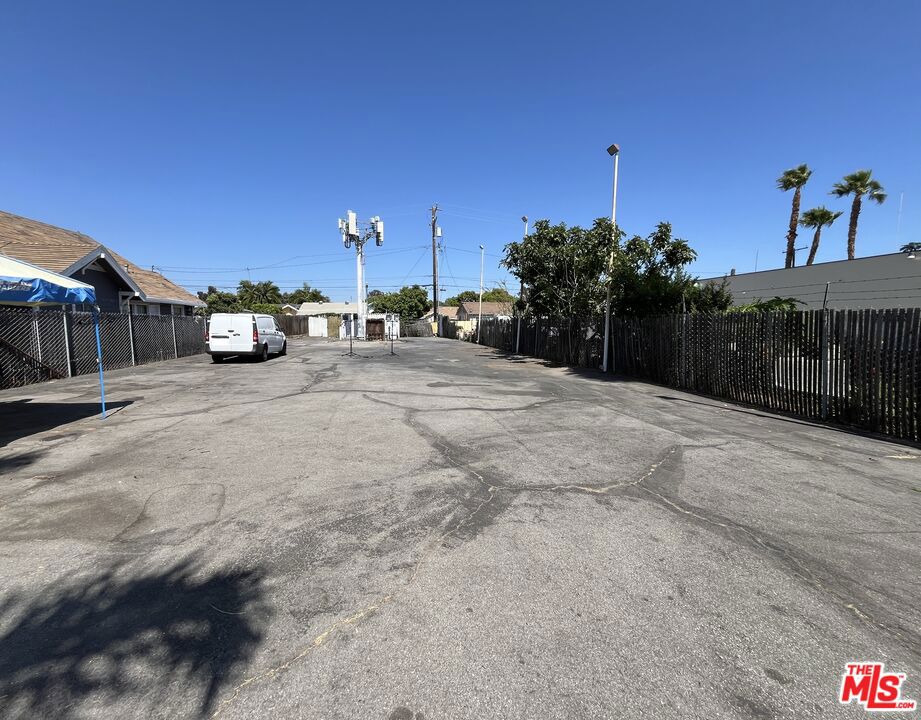One of the last remaining lots in the high traffic Main St. Santa Ana commercial area. Great investment at this price. Very high traffic and pedestrian commercial shopping area. There was a permitted building at one time with water, electric and sewer already permitted. The cell tower is NOT for sale and is in the rear of the property with its parts and storage container. The cell tower company has an 53 year easement to access the tower. There was a small building on the property that was demolished. The utilities are still intact with water, sewage and electric for an easy addition of similarly allowed and permitted building.