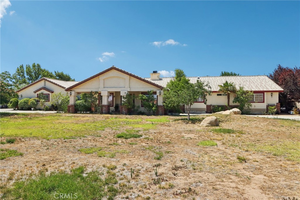 Expansive Ranch-Style Home on over 2 Acres –
Welcome to this beautiful and spacious single-story retreat featuring a formal living room, elegant dining area, comfortable family room, and a chef’s kitchen with granite countertops, a breakfast bar nook, and a walk-in pantry. This home offers 4 generous bedrooms, 3 full bathrooms, a versatile den, and two cozy fireplaces—perfect for relaxing on cool evenings.
The luxurious primary suite boasts its own fireplace, a soothing Jacuzzi tub, a large walk-in closet, and ample room to unwind. Additional highlights include a 5-car garage and a large detached ADU-style storage shed equipped with electricity—perfect for a workshop, studio, or extra storage.
Zoned A-22 and set on over 2 acres, there’s plenty of room for chickens, gardening, and outdoor recreation. Energy savings come easy with a leased solar system!
Bring your animals, toys, and imagination—this exceptional property offers the space and flexibility to create your perfect lifestyle compound.
Pool is not functional and sold As Is.