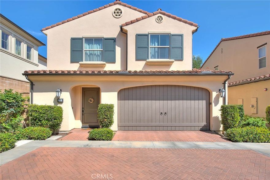 This beautiful, detached, extensively upgraded San Mateo Residence 2 floor plan in the highly desirable Stonegate community offers abundant natural light and a premium, oversized lot, with no neighbors behind. The gourmet kitchen opens to the spacious great room and features a center island, granite countertops, stainless steel appliances, recessed lighting, crown molding and a built-in home management center. The spacious master suite has beautiful en-suite bathroom with walk-in closet and dual vanities. Two additional bedrooms share a nicely appointed bathroom on the second level. Professionally landscaped rear yard with low-maintenance, lush plantings, trellis cover, stone patio and abundant seating - perfect for entertaining. Other features include an upstairs laundry room, tankless water heater, paid off solar panel and a two-car garage. Low HOA fees include numerous community pools, parks, spas, BBQs, tennis courts, sports courts and walking areas. Located walking distance from top-ranked Stonegate Elementary School, Woodbury Town Center and Jeffrey Trail.