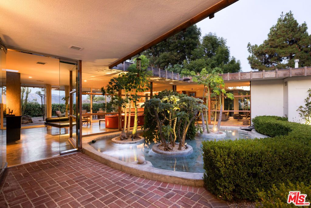 Photo of 3307 Bonnie Hill Drive, Los Angeles, CA 90068 (MLS # 25596935)