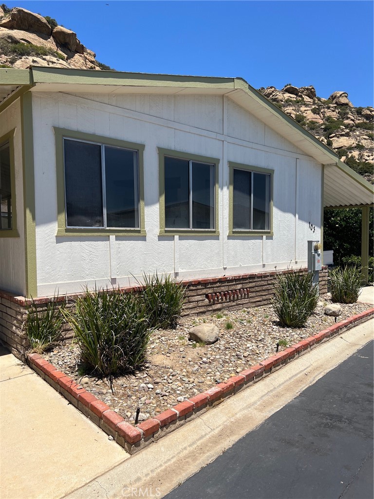 This home has incredible 2 bedroom and 2 bath Home has incredible hillside views and a nice sized backyard. The home has recently been updated with new flooring, new kitchen, new bathrooms and fresh paint.Enjoy this Charming Manufactured Home, peaceful serenity overlooking the San Fernando Valley, high above the noise at the top of the community. Private, Gated Community, nestled up in the mountains in a very scenic setting and tranquil. . This is one of the nicest homes in the area.