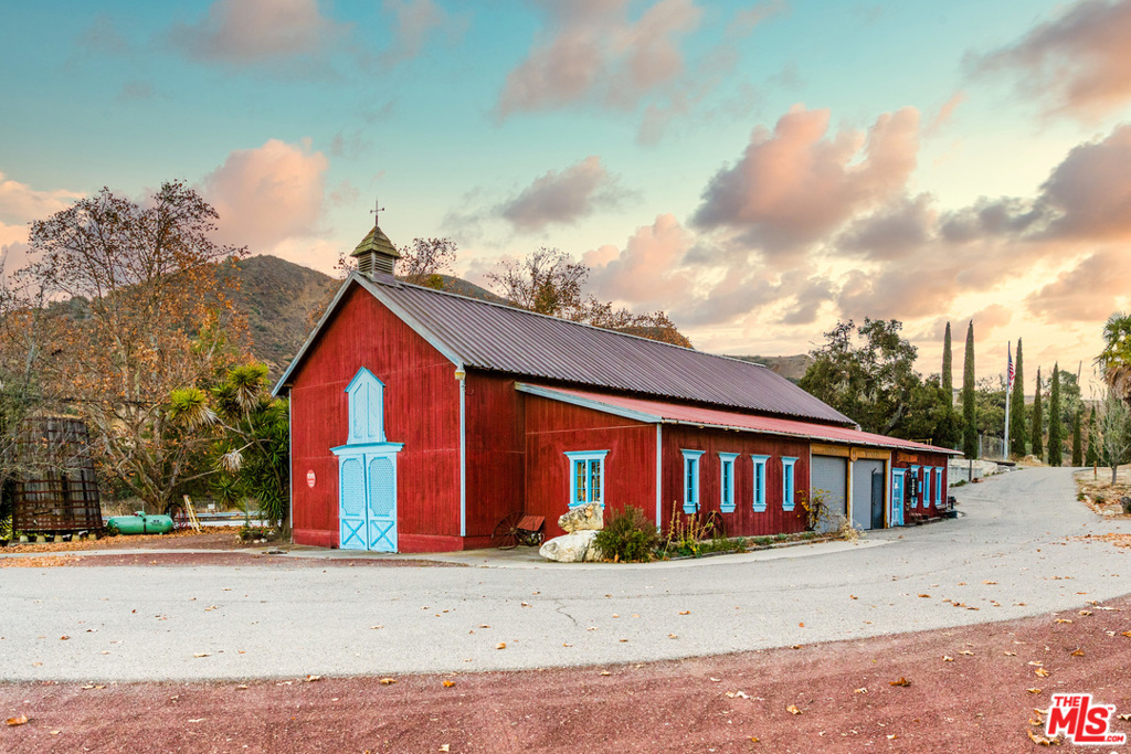 Mosby Vineyard & Winery offers an incredible opportunity to own one of the oldest & prominent wine producing properties in the Santa Ynez Valley. Easily seen from Hwy 101 just south of Buellton off the Santa Rosa Rd exit, this 208 acre property was planted by pioneer winemaker Bill Mosby in 1977. The red barn housing the Mosby Tasting Room is a well-known landmark for locals and visitors alike. Still operating under the original wine permit issued by Santa Barbara County in 1978 this historic property is ready for its next chapter to be written. The unique micro-climate of this location is created by ocean breezes from both Gaviota to the south and Lompoc to the west with clay loam and shale soils supporting approximately 18 acres of Italian varietals including Sangiovese, Pinot Grigio, Sagrantino, Dolcetto and Nebbiolo which demands specific conditions of this vineyard-site to thrive. The rich history of this property is apparent with the old buildings including an Adobe built in 1853