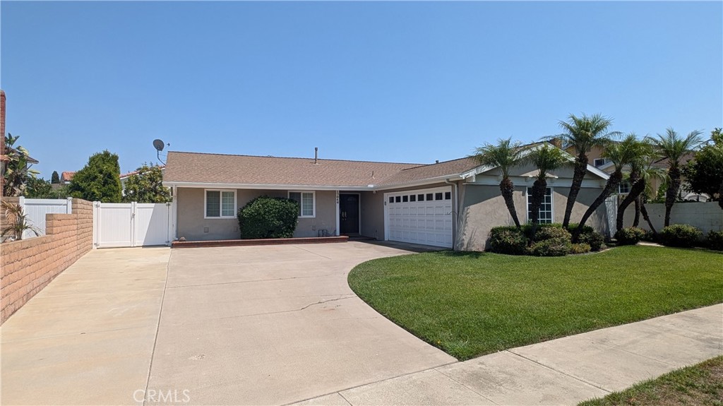 Welcome to Your Dream Home in Fountain Valley — Where Style Meets Comfort! Step into a beautifully renovated appointed iproperty nestled in the award-winning Fountain Valley School District. This single-story home offers a perfect blend of elegance and functionality with standout with its 4 bedrooms and 2 bathrooms. Step into the home with a entryway, which leads into the living room with sliding door into the backyard. You will notice the fresh paint and the crown mouldings all around you with recessed lightings through the entire house. To keep you cool, all windows are energy efficient double-pane windows with plantation shutters. The house has central A/C and heating for your comfort. And furthemore for tech savvy, you can control the lights with your smart app! The dining area has another sliding door and allows you to sit right outside the renovated kitchen with its custom cherrywood cabinets with granite countertops in the kitchen with water purifier and high-end Viking burner stove, and Miele dishwasher. The bedrooms have the premium woven carpet to keep you warm in the mornings. The home boasts an expansive backyard for entertainment for both adults and kids. It has fruit-bearing plants as well as esthetically pleasing trees and shubberies. To get you in with ease, the refrigerator, washer, dryer, outside security camera are included. Location perks include proximity to top-tier groceries, fitness centers, major freeways, and highly rated local schools. And best of all — it’s in Fountain Valley: not just a nice place to live… a GREAT place to call home!