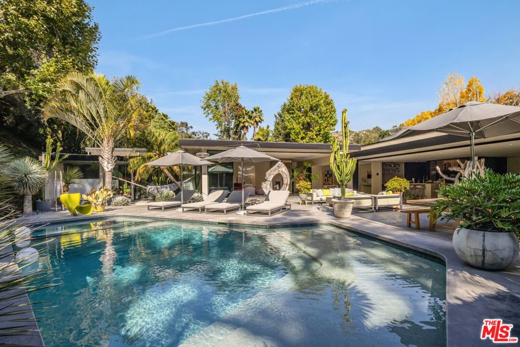 Photo of 1087 Moraga Drive, Los Angeles, CA 90049 (MLS # 26708277)