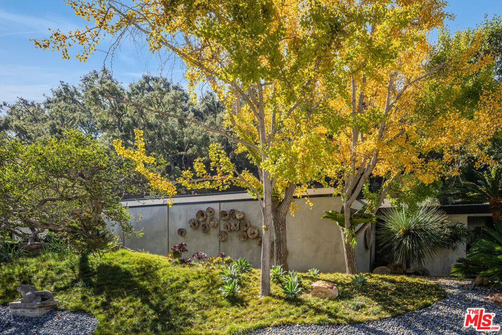 Photo of 1087 Moraga Drive, Los Angeles, CA 90049 (MLS # 26708277)
