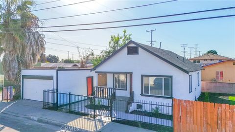 Photo of 1404 E 87th Place, Los Angeles, CA 90002 (MLS # DW26022194)