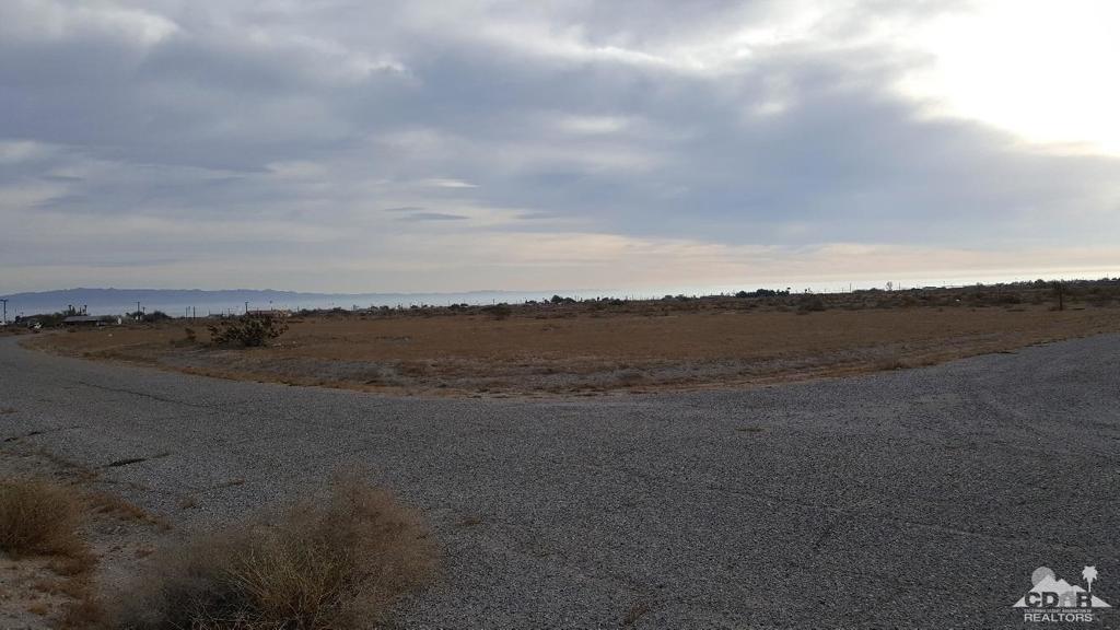 Great opportunity to own this nice size lot to build your dream home. There are four additional lots available for sale listed in the MLS separately. They are all next to each other. This lot is close to the School. Great Mountain and Water views.