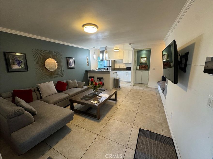 Available Immediately. Move in now.  Furnished OR Unfurnished Unit B



You’ll be impressed with the quality finishes when you enter this gorgeous 1 bedroom, 2 bath, 2 story condo no one above or below you with its beautiful wood flooring. including crown molding and beautiful baseboards throughout. 



From the spacious living room to the elegant kitchen, this inviting condo has all the amenities necessary for modern living.

The kitchen boasts sleek modern appliances and ample counter space for all your cooking needs. The kitchen has stainless steel refrigerator, hood, garbage disposal, microwave, and pendant lighting over the breakfast bar will make this space a pleasure to cook in.   Adjacent is the sliding door for a private patio, ideal for enjoying your morning coffee or an evening BBQ.



As you ascend up the stairs you'll love the huge bedroom upstairs, furnished or (unfurnished) with two beds, nightstands, a dresser, drapes, and warmly painted walls, with ceiling lights plus a large closet. The separate bathroom is exquisite with a 2 sink vanity and storage drawers, accented framed mirrors, and a newer light fixture. Enjoy the spa-like experience with the large shower featuring frameless glass doors, a gentle shower head, and gorgeous tiled walls.



Plus, the condo offers a 1 car detached garage, providing extra storage space and covered parking.  A full-size washer and dryer are all included in the unit.  



Located in a highly desirable neighborhood, this home is just a short distance from Disneyland, Angel Stadium, and The Honda Center. You'll also enjoy easy access to major freeways, making it easy to get to all of Orange County's attractions.



Don't miss this opportunity to own a beautiful home in one of Anaheim's most sought-after neighborhoods. Contact us today to schedule a private tour!