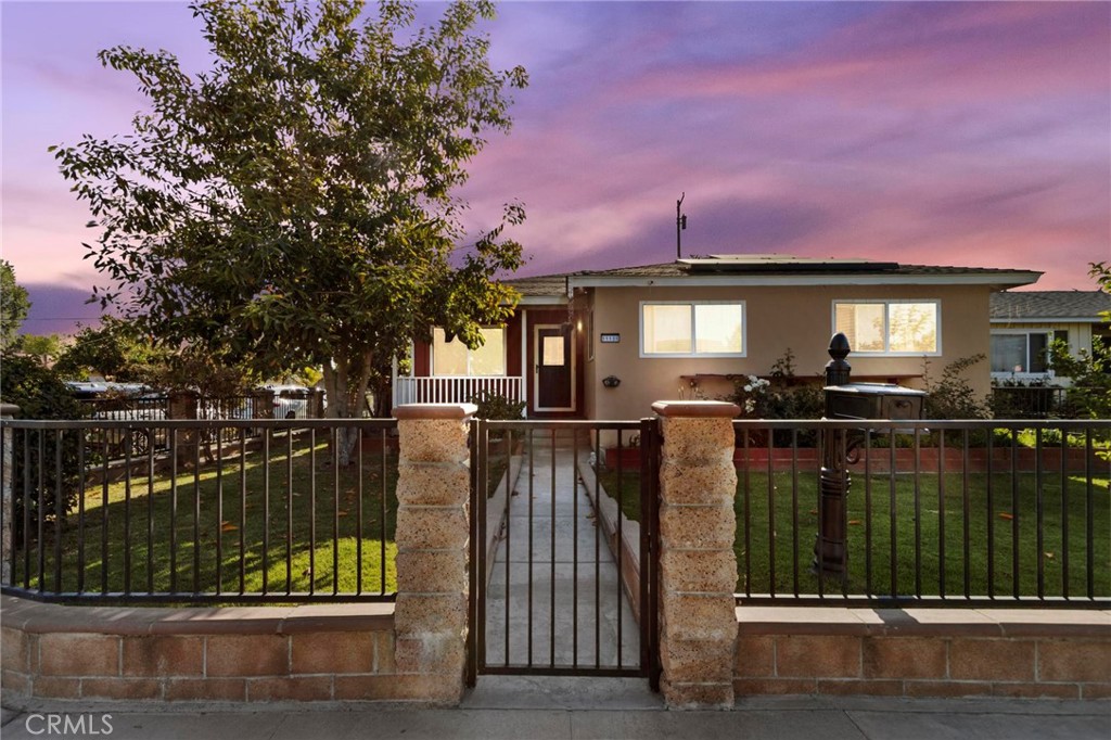 Spacious, Upgraded Corner-Lot Home in Norwalk – Modern Comfort Meets Timeless Charm
Welcome to 11131 Alburtis Avenue, a beautifully updated 3-bedroom, 2-bathroom home situated on a prime corner lot in a desirable Norwalk neighborhood. Offering 1,587 sq ft of well-designed living space on a 4,906 sq ft lot, this home combines functionality, style, and future potential.
Step inside to discover a bright, open floor plan featuring a spacious living room with a classic brick fireplace—perfect for cozy evenings or entertaining guests. The layout flows seamlessly into the dedicated dining area and a modern kitchen with granite countertops, stainless steel appliances, and abundant cabinetry. Whether you are hosting family gatherings or enjoying a quiet meal, this home is designed for easy living. All three bedrooms are generously sized, with one serving as the primary room. The main hallway bathroom is shared among all bedrooms. A second bathroom is located near a flexible den space, which can be used as an office, study nook, or converted into a fourth bedroom. Additional features include central air and heat, energy-saving dual-pane windows, and a detached two-car garage with laundry hookups. The garage sits behind the house for added privacy and offers potential for ADU conversion, home office, or workshop use.
The outdoor spaces have been thoughtfully improved with new concrete in the front yard, driveway, garage area, and backyard, creating a clean, low-maintenance setting ideal for outdoor enjoyment and entertaining. The private backyard is fully enclosed with block walls topped by vinyl fencing and features mature fruit trees, adding both charm and shade to the space. The home includes 15 leased solar panels (approx. $140/month), helping reduce energy costs. The lease is transferable to the new owner. Located near schools, parks, shopping, and dining, with convenient access to major freeways, this home offers both comfort and convenience in a peaceful residential setting. Whether you are a growing family, first-time buyer, or investor, this well-maintained home is a rare find in today’s market.