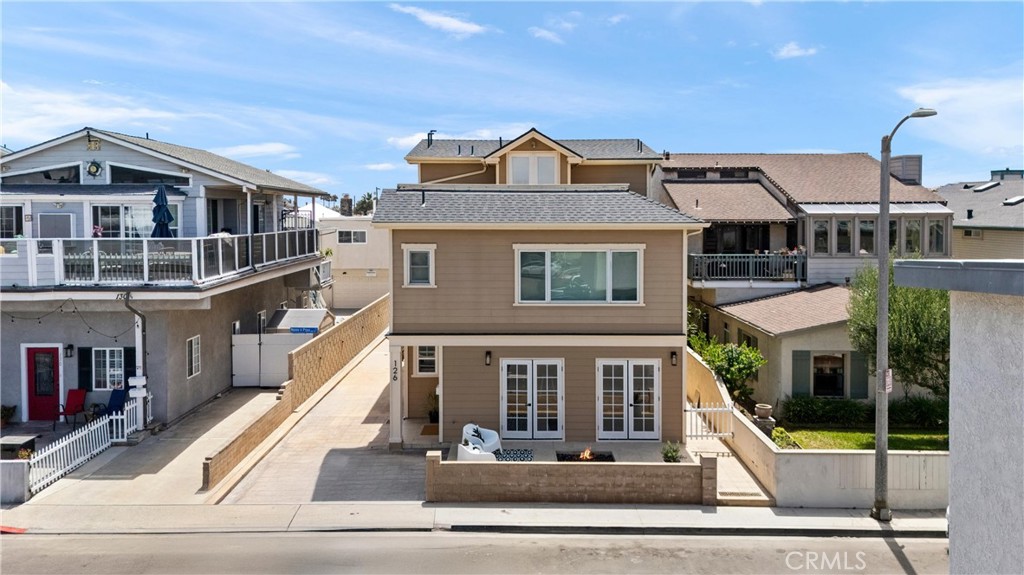 Welcome to 126 47th Street, an exceptional beach property situated in one of Newport Beach's most iconic locations. This stunning home boasts a 45-foot wide lot, offering an expansive layout that feels even more spacious than its impressive dimensions suggest.
Step inside to discover an open-concept kitchen equipped with top-of-the-line Viking range and Sub-Zero refrigerator. The large island doubles as a dining table, perfect for entertaining. Each of the three generously-sized bedrooms features built-in closets, with the primary bedroom offering a private suite experience. The bathrooms exude a resort-like ambiance, providing a luxurious retreat.
The home is designed with high ceilings and stylish ceiling fans, enhancing the airy feel throughout. Outside, the expansive patio is complete with a large firepit, ideal for cozy gatherings. There's ample parking with a two-car garage and a side driveway that serves as guest parking, easily accommodating 4+ cars.
For those seeking a tranquil escape, the roof deck provides a serene space away from it all. Located just three houses away from the ocean and within walking distance to the beautiful Sunset Ridge Park, this property offers both convenience and leisure in Newport Beach living.