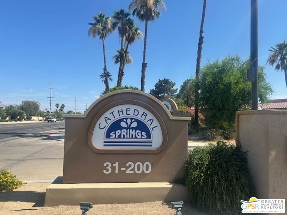 Welcome to Cathedral Springs! A vibrant and well maintained complex of 248 homes in a gated community conveniently located near dining, shopping and local amenities. This two bedroom lower level home is perfect for a homeowner not interested in lugging groceries, etc. up stairs. The kitchen, right off the dining area, boasts an open concept with stainless steel appliances. The master bedroom features its own en-suite bathroom and opens out to a patio that is perfect for enjoying morning or evening beverages while overlooking the tranquil grounds. One closet has hook ups for a stacked washer and dryer. Located just steps from one of four pools, this complex offers well-maintained open spaces, Barbeque area and a fitness center. This is the perfect combination location, serenity and desert lifestyle!