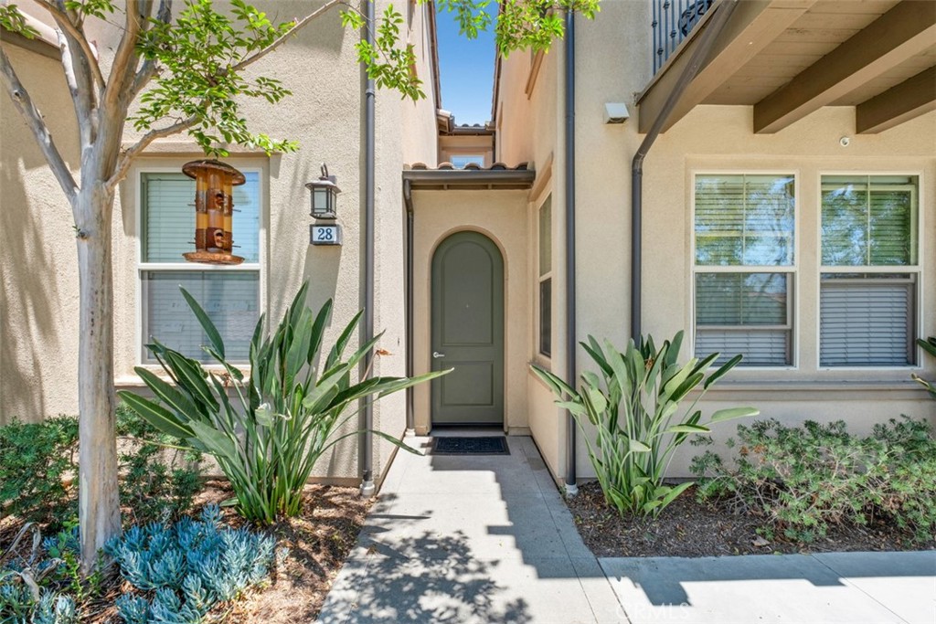 Luxury Live Auction! Bidding to start from $750,000! Welcome to 28 Poppy, a light and bright 2 bedroom, 2 bath home located in the sought-after Lake Forest community of Baker Ranch. This home features a wide-open, “great room” style floor plan with engineered wood floors and a spacious kitchen with granite countertops, stainless appliances and tons of cabinet space. The primary suite includes a walk-in closet, dual sinks, and an extra-large shower. The large second bedroom can also be a guest room, office, or creative space. There is also a private breezeway entrance that provides extra security and privacy. Additional amenities include a two-car attached garage, indoor laundry room, recessed lighting throughout and a large private balcony overlooking the neighborhood. Baker Ranch is a highly desired community known for its amenities, including multiple pools, spas, clubhouses, playgrounds, a splash pad, basketball and tennis courts, pickleball, beach volleyball, picnic areas, dog parks, and scenic walking trails. Conveniently located near major freeways, the Irvine Spectrum, John Wayne Airport, top-rated schools, shopping and dining, and the OC Great Park. Come see!