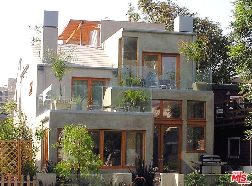 Tranquil Venice Canals contemporary -- FULLY FURNISHED, FOR SHORT TERM RENTAL (3 to 6 mo.) with premium furniture and finishes. Move-in ready.High ceilings, bright open spaces, decks with views, incl. roof deck -- perfect for short-term creative working retreat or executive relocations. Includes a loft-based officesetup, Wi-Fi, HD-TVs, PS3, DVR, Whole-House Audio, etc.  One secondary bedroom configured as complete in- house gym rather than sleeping quarters (free weights,cardio gear, bench, mats). Canoe/dock and bikes! Walk to beach, Abbott Kinney, Venice boardwalk and Venice pier shops.Agent Remarks: Owner is a licensed broker. Utilities (add'l) & cleaning service (weekly) will continue thru short-term lease, with expenses to be reimbursed to landlord from tenant.   Home often serves as a weekly vacation rental, 1-2 weeks at a time - with scores of happy guests and 5-star reviews.