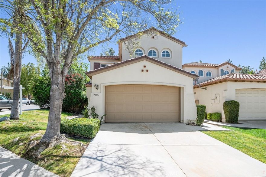 Welcome to 28301 Lobelia Ln. an exceptional 4 bedroom, 2.5 bathroom two-story Home nestled in the highly sought-after ‘Wildrose’ neighborhood of Valencia, California. Upon entry, you are greeted by an arched wooden door followed by an inviting interior that boasts a perfect blend of elegance and functionality. Acknowledge the presence of high ceilings and natural light that has made its way through the large windows, providing a warm and inviting atmosphere. Not to mention, the family room offering a cozy like retreat with a fireplace. The kitchen and dining area offers a layout that caters to both cooking enthusiasts and social gatherings. The kitchen features white cabinets with granite counter tops, a great size center island, double oven, dish washer, stove, and a microwave. Other downstairs highlights include a guest bathroom, large storage closet, indoor laundry room, and a finished garage. The upstairs hosts 3 bedrooms, 1 bathroom and a master en-suite. Master en-suite features vaulted ceilings, a stand-up shower, a separate tub, dual sink vanity, and a walk-in closet. Right off the kitchen, the sliding door will lead you to your private oasis. The location is truly picturesque, with rolling hills and nearby bike and walking paths providing the perfect backdrop for an active lifestyle. Close to the city's best schools, paseos, parks and the HOA's many amenities including tennis courts, three swimming pools with jacuzzies and kiddie pools, a basketball court, and a modern rental clubhouse with a full kitchen and outdoor barbecues! Don't miss the opportunity to make this your new home - a place where style, comfort, and convenience converge. YES HOA; NO Mello-Roos!