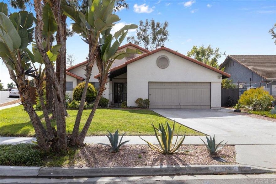 Welcome to this beautifully renovated single-story home in the desirable Vista, CA. Tucked away on a peaceful cul-de-sac and set on a spacious corner lot, this 3-bedroom, 2-bathroom home offers the perfect combination of modern updates and comfortable living. The home is thoughtfully designed with an open floor plan that seamlessly connects the living spaces, making it perfect for both everyday living and entertaining.  The brand-new kitchen is a true highlight, featuring sleek countertops, stylish new cabinetry, and high-end stainless-steel appliances. Whether you're preparing a gourmet meal or enjoying a casual breakfast, the kitchen is both stylish and functional. The open living area features a modern tiled fireplace, creating a warm and inviting atmosphere for family gatherings or quiet nights in.  Each of the three bedrooms is generously sized, with plenty of natural light and freshly updated LVP flooring throughout. The bathrooms have been beautifully renovated with modern finishes.  Outside, the large, private yard offers plenty of space for outdoor activities, gardening, taking in the mountain views, or simply enjoying the California sunshine. This home provides peace and privacy while still being conveniently close to local parks, schools, and shopping.  With its thoughtful updates, spacious layout, and fantastic location, this home is truly move-in ready and waiting for its next owners. Don’t miss your chance to see this stunning Vista property—schedule a tour today!