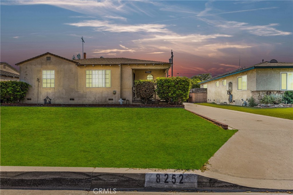 3 SEPERATE STRUCTURES - MAIN HOUSE, REAR UNIT, DETACHED 2 CAR GARAGE - AMAZING ADU OPPORTUNITIES! Welcome to this inviting 2-bedroom, 1-bathroom home situated on a spacious 6,697 sq.ft. lot in one of Downey’s most sought-after neighborhoods. With 934 sq.ft. of comfortable living space, this home offers the perfect blend of character, functionality, and potential. Step inside to discover a warm, light-filled interior with a functional layout. The detached 2-car garage and long driveway provide ample parking for multiple vehicles, RVs, or future development.
There is also the exciting potential for two ADUs on the property (buyer to verify), offering buyers a rare opportunity for expansion, rental income, or multigenerational living. Enjoy outdoor living year-round with a covered patio, perfect for entertaining, weekend BBQs, or simply relaxing in your private backyard oasis. The large lot also offers endless potential for gardening, play areas, or future expansion.
Located in a quiet, established neighborhood near top-rated schools, parks, shopping, and freeways—this property combines convenience with opportunity.