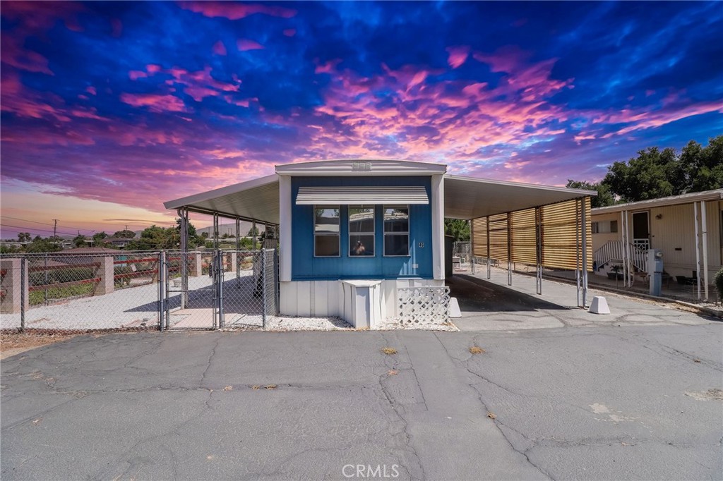 Welcome to 12995 6th St, Yucaipa, CA 92399! This adorable single-wide mobile home is situated on a spacious corner lot with plenty of parking and gorgeous mountain views. The cozy interior offers comfortable living, and there's even an option to have it sold fully furnished, just move right in! Located in a quiet, well-kept community with easy access to local shops, dining, and freeways. Don't miss this charming, affordable home with so much to offer!