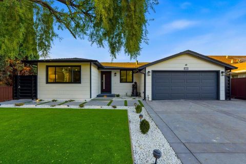 Photo of 1485 Meadow Glen Way, San Jose, CA 95121 (MLS # ML82029345)