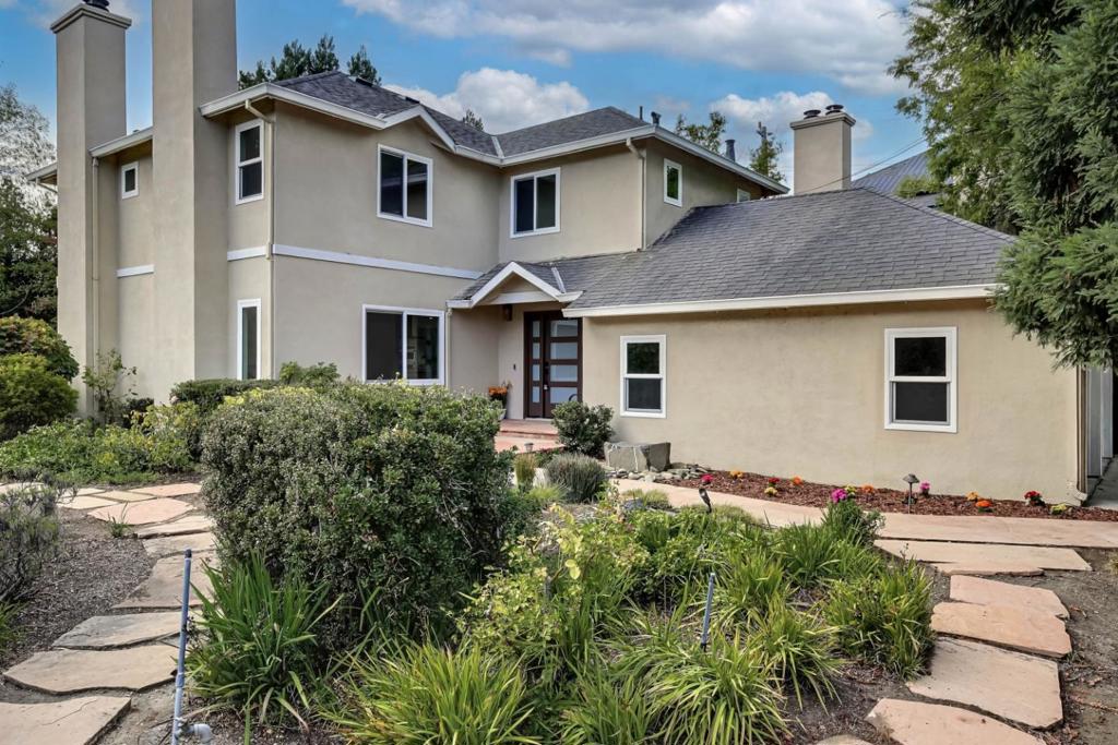 A newly renovated home in the heart of the Peninsula, near Stanford University, top tech hubs like Google and Meta, & downtown Menlo Park. With 1,890 SF of living space & over 10,817 SF Lot. Step inside to find engineered hardwood floor & recessed lighting. It features a fireplace & large windows, & a family room. The kitchen features a bay window, quartz waterfall-edge island, white shaker-style cabinetry, glass-front display shelving, & stainless steel appliances: French-door refrigerator, wall oven, built-in microwave, induction cooktop, & chimney-style hood. Upstairs, the bedrooms are big & bright. The primary suite has a tray ceiling, recessed lighting, & a bath featuring a floating double-sink vanity, freestanding tub, frameless glass shower with rainfall showerhead, accent tile wall, & backlit LED mirrors. Secondary bathrooms echo the same high-end finishes with sleek floating vanities, modern tile, & frameless shower enclosures. The outdoors boasts perfectly landscaped gardens, a stone-tiled entry porch, patios, arbors, footpaths, & fountain. With easy access to hwys 101, 82, & 84 The 6,575 SF lot sits adjacent to an approximate 4,242 SF open yard owned by the (SFPUC), buyer to verify usage restrictions & encroachment permits.