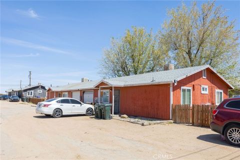 Photo of 12050 Sand Ave Ave, Adelanto, CA 92301 (MLS # IV26009972)