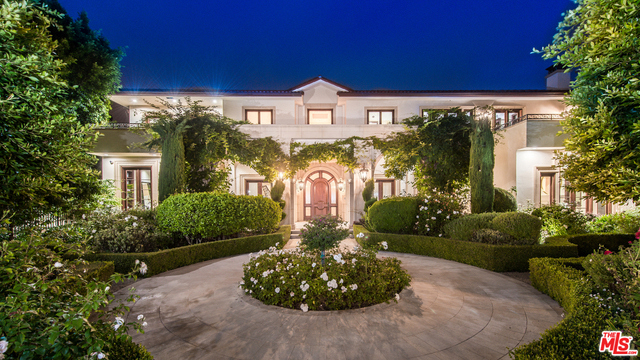 Located in highly desired Brentwood Park, this gated and private French Mediterranean estate was custom built in 2010. Upon entering the gates you are welcomed by enchanting gardens and an impressive front entry with soaring ceiling height and a grand double height foyer. Open style living with a formal living room on your left, family room with bar on your right. Large backyard with a spacious open patio, expansive grassy lawns, beautiful pool, spa, pool house cabana, built-in BBQ, and an outdoor dining area made perfect for entertaining and outdoor dinners. Inside you will find a large chefs kitchen which leads directly into the large scale formal dining area. Upstairs provides 5 beds in total including the master with 2 walk-in closets, duel master baths, spa tub, and a private balcony that offers breathtaking views. Take the elevator down to the basement level which is an entertainers paradise with media room, wine cellar and bedroom. A property of this caliber will not last long.