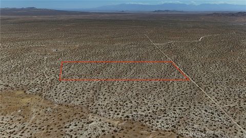 Photo of 734 Ave C (NEAR), Adelanto, CA 92301 (MLS # HD26087730)