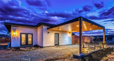 Photo of 5125 Sunfair Road, Joshua Tree, CA 92252 (MLS # JT26081033)