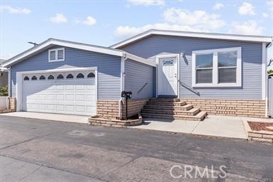 Welcome to 9080 Bloomfield Ave, Space 11, Cypress, CA 90630 – a beautifully appointed 3-bedroom, 2-bathroom home with over 1,600 sq ft of living space situated on an oversized lot in the highly desirable **Lincoln Center Mobile Home Park**. This rare offering includes a **private 2-car garage**, gated vinyl fencing on both sides, and a **custom doggy ramp and door** for your furry family members. Enjoy outdoor living with a secure, low-maintenance yard—perfect for entertaining or relaxing in peace. As an added bonus, **the seller is offering to pay the buyer's first month's space rent**. Step inside to an expansive open layout featuring **natural light, spacious bedrooms, full-sized bathrooms**, and a large kitchen ideal for gatherings and meal prep. The home offers both comfort and functionality with plenty of storage and privacy throughout. Lincoln Center is a **family and pet-friendly community** that offers resort-style amenities including a swimming pool, basket ball courts, play play area, gym, clubhouse with entertainment including pool tables, library area and fireplace, game room and a designated dog park—perfect for an active lifestyle. Located in the heart of **Cypress**, known for its top-rated **Cypress School District** including **A.E. Arnold Elementary, Lexington Intermediate, and Cypress High School**, this home is also conveniently positioned near major shopping, dining, and entertainment centers. With a **Walk Score of 63**, **Transit Score of 42**, and **Shopping Score of 70**, daily errands and weekend outings are a breeze. Cypress is a vibrant city with tree-lined streets, award-winning parks, and easy freeway access to nearby Orange County attractions. Don’t miss this opportunity to own a spacious, turn-key home in one of Cypress’s most welcoming communities!