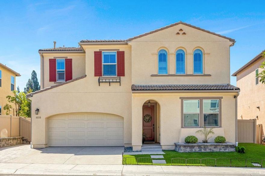 Experience coastal California living in this stylish 4-bedroom, 3-bath, 2,256 sq ft single-family home located in the sought-after Neptune neighborhood at Melrose Heights. This modern residence combines energy efficiency and designer upgrades with 10 owned solar panels, dual-pane vinyl windows, and durable luxury vinyl plank flooring. The gourmet kitchen impresses with quartz countertops, tiled backsplash, under-cabinet lighting, and a premium GE Café appliance suite; featuring a dual-fuel double oven & 6-burner range, built-in microwave, dishwasher, and French door refrigerator with water and ice dispenser. The kitchen flows comfortably into the spacious dining area and family room, creating the perfect space for gathering, entertaining and staying connected. A first-floor bedroom and full bath make this home ideal for multi-generational living. Thoughtful details include a closet with extended under-stair storage area, ceiling fans, and an upstairs laundry room with utility sink. The primary suite is a spa-like retreat with a soaking tub, separate shower, and generous walk-in closet. Additional highlights include a 2-car garage, tankless water heater, EV charger and access to community amenities such as multiple tot lots, a pool, BBQs, and picnic areas. Conveniently close to shopping, dining, and transit—and just a short drive to the iconic Oceanside Pier and sandy beaches.