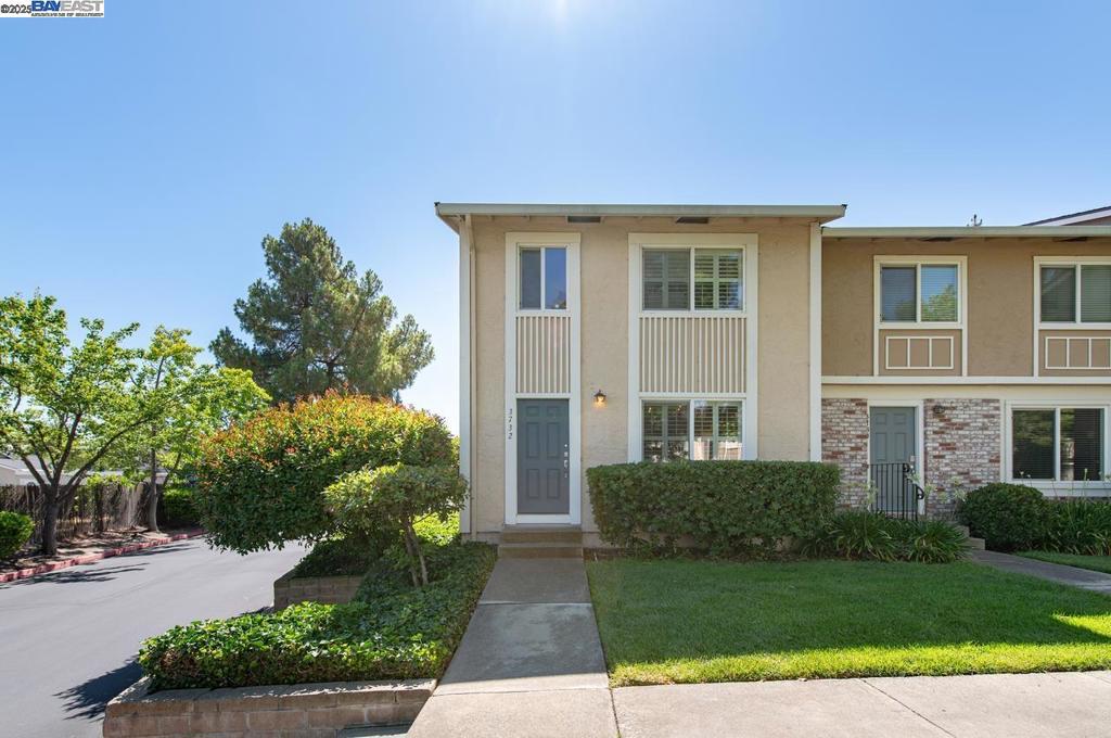 Modern End-Unit Townhouse in Prime Livermore Location! Perfect blend of style, comfort, and convenience in this beautifully updated 2-bedroom, 1.5-bath townhouse, ideally located just minutes from Livermore’s vibrant downtown. This desirable end-unit offers 1,120 sq. ft. of light-filled living space with numerous upgrades throughout. Step inside to find gleaming hardwood floors, custom paint, and carpet in the bedrooms. The remodeled kitchen features sleek granite countertops, stainless steel appliances, and abundant cabinet space for your storage needs. Enjoy the comfort of a newer HVAC system, dual-pane windows, and in-unit laundry for modern-day ease. Relax or entertain in the private backyard with direct rear access—perfect for BBQs or unwinding after a day of exploring local wineries. Parking is a breeze with one covered space, one uncovered space, and additional community parking available. This turnkey home has it all—location, updates, and lifestyle. Close proximity to East Avenue Middle and Livermore High School!