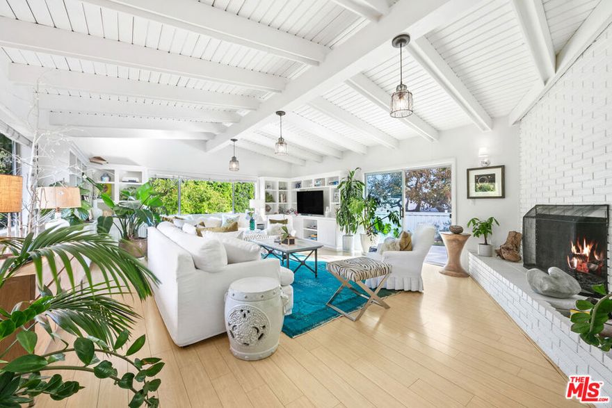 Best value on Pt. Dume... private, ranch style home on almost two useable acres and includes a coveted Riviera 2 Beach Key. Main house has a spacious sunny living area with wood burning fireplace, 3 bedrooms, all en-suite, a huge, covered "barn style" area perfect for entertaining along with a couple of bonus rooms and bath with a separate entrance, which can be used as a gym, caretakers area or additional living space. Charming detached guest house has two bedrooms, one bath and complete kitchen. Tons of fruit trees...truly a magical property. THERE IS ALSO A COASTAL DEVELOPMENT PERMIT, ready to go for an approx. 8,500 sq ft. spectacular contemporary estate with pool by Malibu architect Lester Tobias. Stamped plans are available for viewing at the property with a scheduled showing. Rendering will be available shortly.