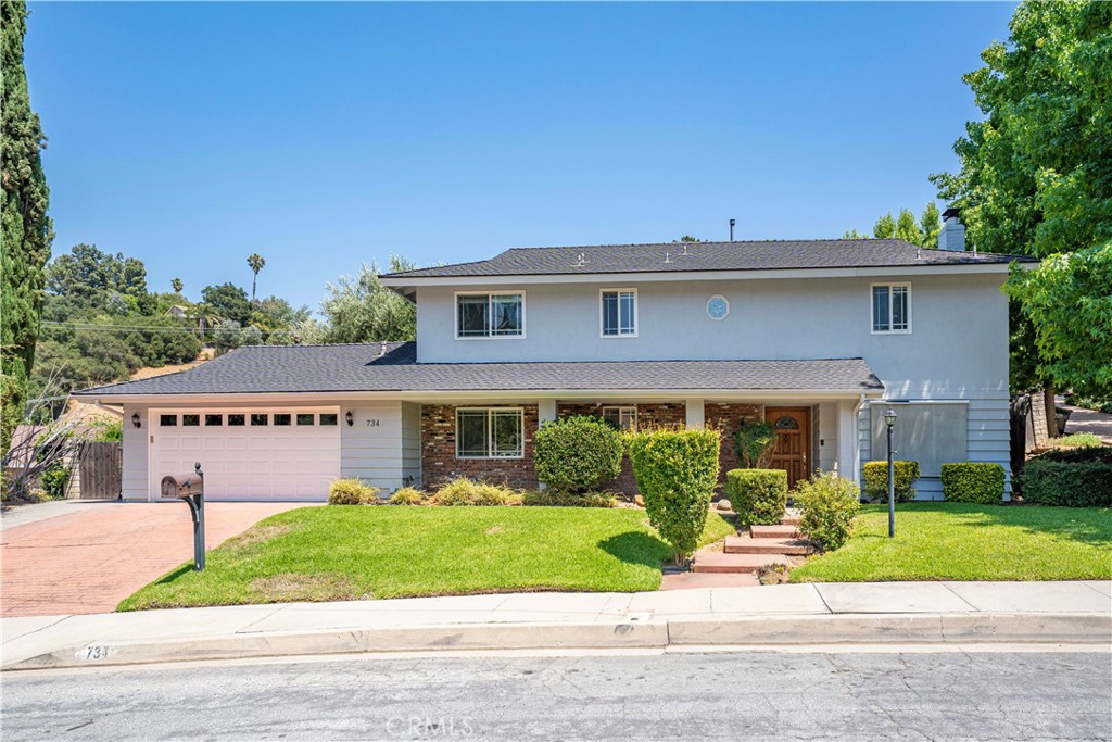 Tucked away in a cul-de-sac neighborhood, this beautifully updated two-story home offers space, style, and comfort for today’s modern lifestyle. With 4 bedrooms and 3 bathrooms, this home welcomes you in with great curb appeal and a bright, open floor plan designed for easy living and entertaining. Step into the spacious living room featuring a cozy fireplace, abundant natural light, and sliding glass doors that lead to the backyard. The updated kitchen seamlessly flows into the family room and dining area great for hosting gatherings or enjoying everyday moments with additional access to the outdoor space. Upstairs, the large primary bedroom offers a relaxing retreat with a well-appointed bathroom, complete with dual sinks and a separate vanity area. Three additional generously sized bedrooms and a full hall bath provide plenty of room for family, guests, or a home office. A convenient half bath is located on the main level, along with direct access to the 2-car attached garage. Recent updates include new vinyl flooring, plush carpet, fresh interior paint, crown molding, recessed lighting, dual pane windows, and central AC adding comfort and efficiency throughout. The backyard is a standout feature, with a yard that extends beyond the rear fence offering extra space for play, gardening, or future possibilities. Ideally located near schools, parks, and shopping, this home blends convenience with charm. Don’t miss your chance to make it yours!