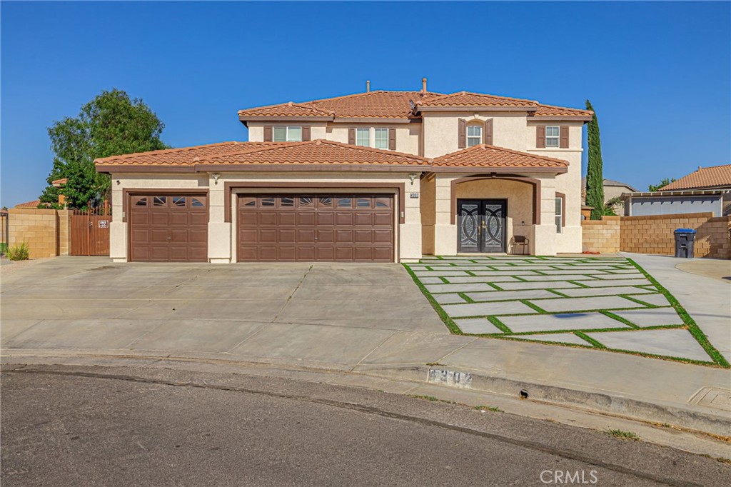 Are you ready for the summer? Welcome to this desirable and Elegant Quartz Hill home. This 5 bedroom, 3 bathroom and 3 car garage home sits in a cul de sac neighborhood and ready for entertainment. Designer cement rectangles with turf grass in between, in the back and front yard to add extra style matching the stunning clear refreshing pool. Meticulously manicured inside and out with upgraded front master piece double French iron glass door. Beautiful Tile flooring downstairs and waterproof wooden laminate planks flooring upstairs. Recently upgraded majestic kitchen with quartz countertops with an open concept to the living room. Stainless steel appliances with a double oven. All bathrooms match the same quartz countertop. Double sided gas chimney. Great size bedroom downstairs with a full bathroom next to it. Oversized Primary bedroom with barn door entry to primary bathroom. Enjoy the Shower and bathtub separately. Primary bedroom has his and hers walk in closets, with one having access from the primary bathroom. All other bedrooms also show great size for comfort. Laundry is located upstairs for your convenience. Enjoy and entertain in the huge back yard under a recently added Gazebo or just refresh in the pool. If you like gardening, the block retaining wall gives you the option to plant your own plants. Conveniently located near parks, schools, shopping centers and entertainment. These keys can be yours. The doors are open. Want to make it yours? Make your appointment today!!!