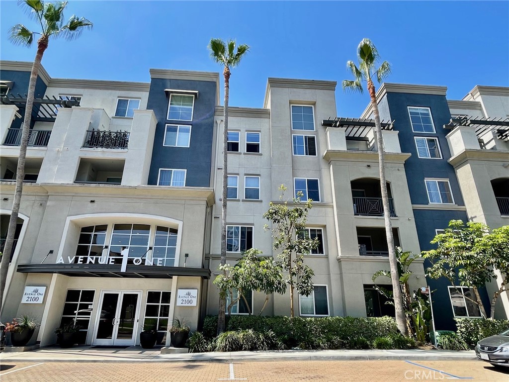 Looking for a lifestyle upgrade? This condo is different from the rest! TONS OF ROOM in this stunning penthouse corner unit that will check all the boxes. Perched on the top floor with soaring cathedral ceilings and walls of windows, this light-filled beauty is anything but ordinary. From the moment you walk in, you’ll feel the difference! It is bright, open, and full of that wow factor. The open-concept layout flows effortlessly with flexibility in mind. Dual primary suites are on opposite ends of the unit with a spacious upstairs loft! Convenient in-unit laundry, brand new carpet, fresh paint, and new window coverings tastefully updated for modern elegance. You’ll also enjoy two side-by-side reserved parking spots plus your own oversized storage unit which is a rare find in condo living. Step outside your door and enjoy resort-style amenities including a Jr. Olympic pool, spa, fitness center, and even a basketball court. Whether you're looking to unwind or stay active, it’s all here. And let’s talk location! You’re right in the vibrant heart of Irvine, just minutes from world-class shopping, dining, UCI, John Wayne Airport, and some of Orange County’s best parks.