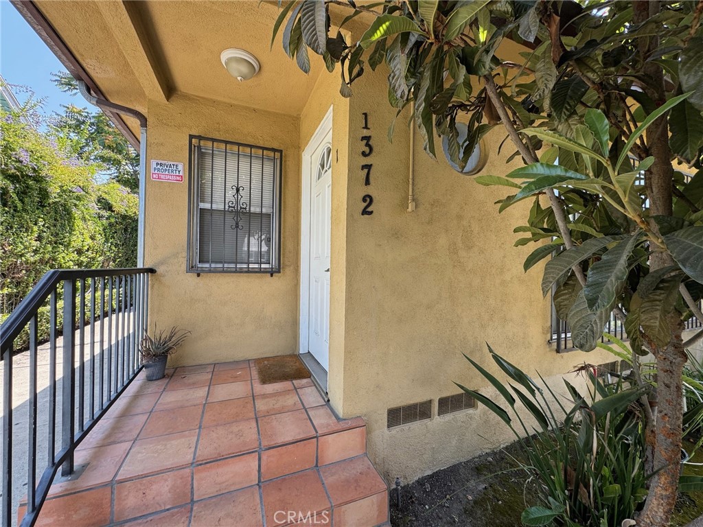 Welcome to 1372 W. 36th Street #1, a charming and spacious 3-bedroom, 1-bath 1,100apartment nestled within a well-kept quadplex in South Los Angeles. This residence is filled with character, comfort, and exceptional value. From the moment you enter, you’re greeted by rich hardwood floors and an abundance of natural light that pours through large windows, creating a warm and inviting atmosphere. The living space is accented with recessed lighting and ceiling fans, providing both style and comfort. The 3 bedrooms offer plenty of room for relaxation, work-from-home functionality, or simply stretching out in peace. The kitchen is well-equipped with included appliances, making it easy to settle in and start living. The shared laundry area adds everyday convenience, while the gated property provides a sense of community and security. An assigned parking space is included, a valuable amenity in this vibrant part of Los Angeles. Ideally located just over a mile from the USC campus, this home is perfect for students, faculty, or professionals who want to enjoy the energy of city life with the comfort of a quiet retreat. The area offers easy access to public transit, downtown LA, and a wide array of local shops, restaurants, and cultural hotspots. This inviting apartment truly offers the best of both worlds—modern amenities, classic charm, and a central location with proximity to everything Los Angeles has to offer.