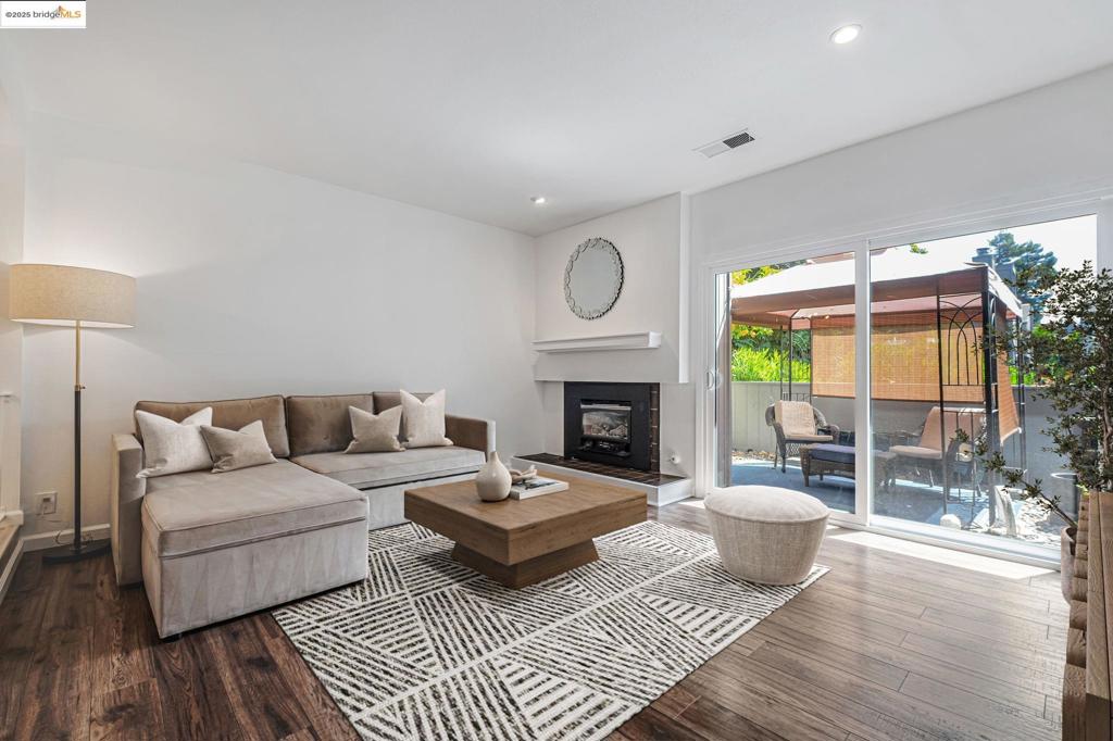 Inviting 2 Bedroom, 2.5 Bathroom North Hayward Townhouse Near Park, Pool & Commuter Routes Step into this warm and welcoming North Hayward townhome. Featuring two spacious bedrooms—each with its own en suite bathroom—this home offers a comfortable layout, everyday conveniences, and plenty of potential to make it your own. Tucked just behind the newly renovated Kennedy Park—with playgrounds, picnic areas, and open green space—and only steps from the private community pool and clubhouse, it's a perfect setting for anyone seeking both fun and relaxation close to home. Inside, you'll find a recently updated kitchen with modern appliances and custom solid-wood cabinets. The generous living room features a cozy gas fireplace for cool evenings, while all-new (2025) windows and shutters fill the space with natural light. Out back, a private east-facing patio provides the ideal spot for morning coffee or weekend lounging. Need to get around? You're just minutes from major freeways, shopping, dining, and all the essentials of daily life. This North Hayward gem combines comfort, location, and potential in one inviting package. Come see what makes it feel like home!