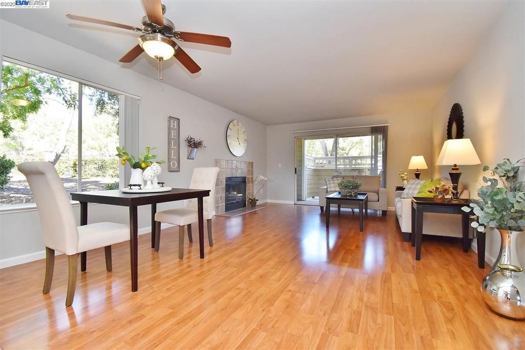 You will fall in love with this updated ground floor level-in end unit luxury condo in the highly desirable resort-like Reflections community! Enjoy plenty of room to roam with two bedrooms and two baths with an open living and dining area featuring wood floors and a tile fireplace. The modern kitchen’s features include granite counters, stainless appliances, tile floor, & glass door cabinet. Other features include updated baths, in-unit laundry, covered carport, Nest thermostat, some USB sockets & storage area off the patio. Amenities include a large community pool, spa, BBQ area, gym, community room, and amazing water features. The location could not be closer to everything as you can walk to the Market Place shopping center and a variety of restaurants, Nob Hill grocery, Trader Joe’s, Starbucks, Fitness 19, and more. Just a short walk further is the Bishop Ranch City Center with The Lot movie theater, restaurants, boutiques, and the central square for relaxing around. Welcome Home!