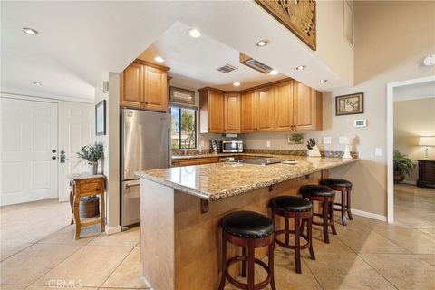 Photo of 77277 Olympic Way, Palm Desert, CA 92211 (MLS # PV25274580)