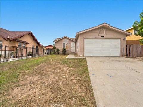 Photo of 1124 W 104th Street, Los Angeles, CA 90044 (MLS # OC26228916)