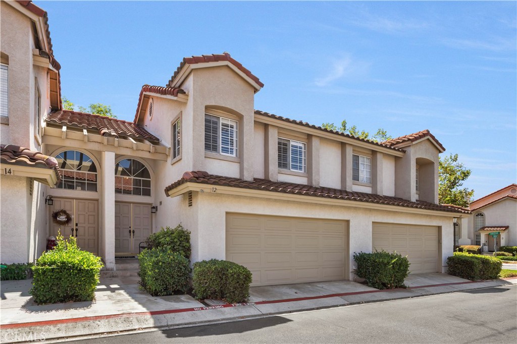Welcome to 12 Azalea in Rancho Santa Margarita! This 3-bedroom, 2.5-bath condo offers 1,174 square feet of living space in one of Orange County’s most desirable communities. This wonderful home provides a blank canvas for your personal updates and upgrades. The living room features a cozy fireplace and opens to the dining area and kitchen, creating a seamless space for gatherings. Upstairs, you’ll find three comfortable bedrooms, including a primary suite with its own bath. The private rear patio offers an inviting outdoor retreat, perfect for relaxing, gardening, or hosting summer barbecues. The biggest draw is its prime location. Just across the street from Trabuco Mesa Elementary and a short distance to Rancho Santa Margarita Lake, you’ll enjoy lakeside trails, community events, and membership access to the Beach Club. Shopping, dining, and conveniences are just minutes away at the Ralphs Shopping Center and nearby plazas. Inside, the floor plan is bright and functional. Living in Rancho Santa Margarita means access to outstanding amenities: multiple pools, tennis courts, playgrounds, parks, and miles of hiking and biking trails. With award-winning schools, a vibrant community feel, and convenient access to freeways, this home offers the lifestyle buyers are looking for. Whether you’re a first-time buyer eager to get into the market, an investor seeking a well-located property, or someone ready to customize a home in an incredible neighborhood, 12 Azalea is an opportunity to create value and make it your own. Don’t miss your chance to call this special property home!