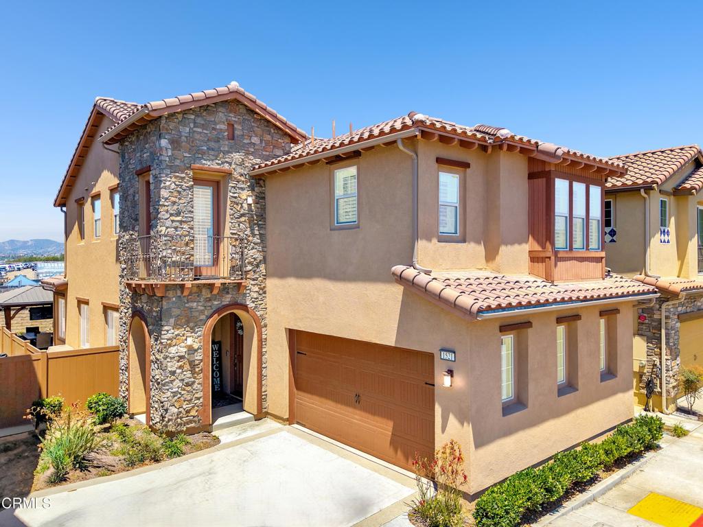 Modern Coastal Living | 1521 Thorpe Trail, North Oxnard, a stylish and thoughtfully upgraded 3-bedroom, 2.5-bathroom home built in 2020, nestled within a private gated community in North Oxnard.Enjoy a lifestyle of comfort and leisure with resort-style amenities including a sparkling pool, spa, clubhouse, playground, and a scenic community park. Ideally located just minutes from the coastline, this residence offers easy access to the beaches, River Ridge Golf Course, and the vibrant shops and restaurants at The Collection at RiverPark.Inside, the home features a bright and open layout with luxury vinyl plank flooring, tiled bathrooms, and custom window treatments throughout. The modern kitchen and spacious living areas provide the perfect setting for both daily living and entertaining.Step outside to a beautifully designed backyard oasis, complete with stamped concrete, a gazebo, and a fire pit dining table, ideal for alfresco dining and relaxed gatherings. Additional upgrades include a whole-home water softening system and other thoughtful enhancements that add style and function.Experience the perfect balance of coastal convenience, community amenities, and upgraded modern living at 1521 Thorpe Trail.