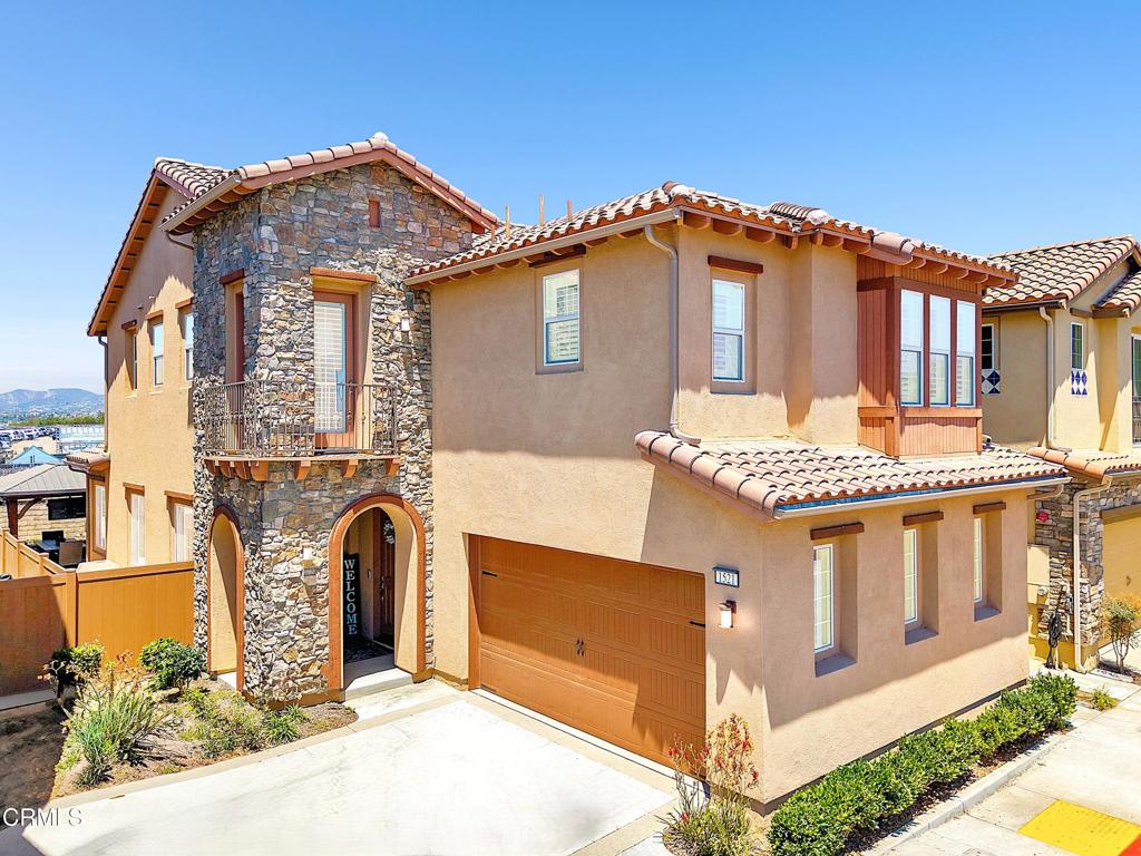 Modern Coastal Living | 1521 Thorpe Trail, North Oxnard, a stylish and thoughtfully upgraded 3-bedroom, 2.5-bathroom home built in 2020, nestled within a private gated community in North Oxnard.Enjoy a lifestyle of comfort and leisure with resort-style amenities including a sparkling pool, spa, clubhouse, playground, and a scenic community park. Ideally located just minutes from the coastline, this residence offers easy access to the beaches, River Ridge Golf Course, and the vibrant shops and restaurants at The Collection at RiverPark.Inside, the home features a bright and open layout with luxury vinyl plank flooring, tiled bathrooms, and custom window treatments throughout. The modern kitchen and spacious living areas provide the perfect setting for both daily living and entertaining.Step outside to a beautifully designed backyard oasis, complete with stamped concrete, a gazebo, ideal for alfresco dining and relaxed gatherings. Additional upgrades include a whole-home water softening system and other thoughtful enhancements that add style and function.Experience the perfect balance of coastal convenience, community amenities, and upgraded modern living at 1521 Thorpe Trail.
